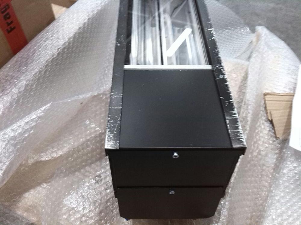UV lamp housing on protective packaging material