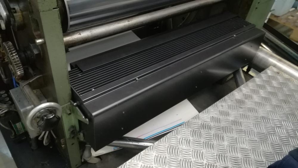 UV lamp housing installed on the Muller Martini machine