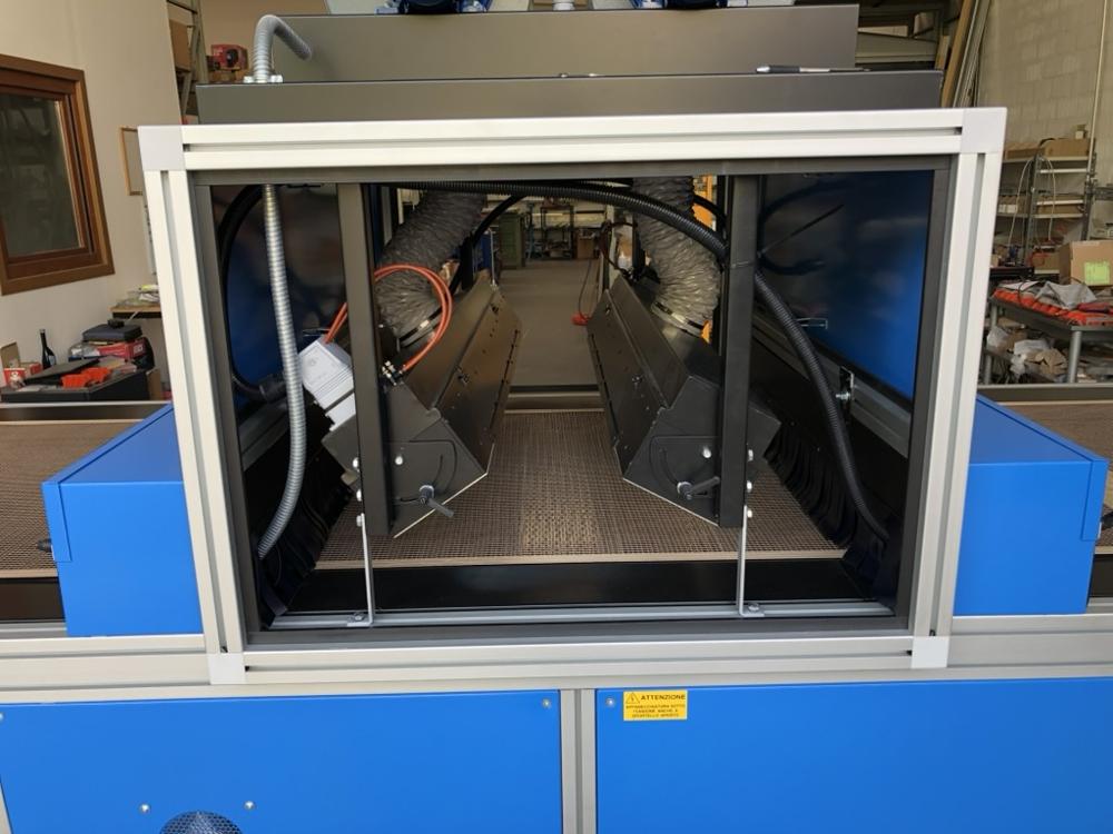 View inside the machine with the rotary shutter system.